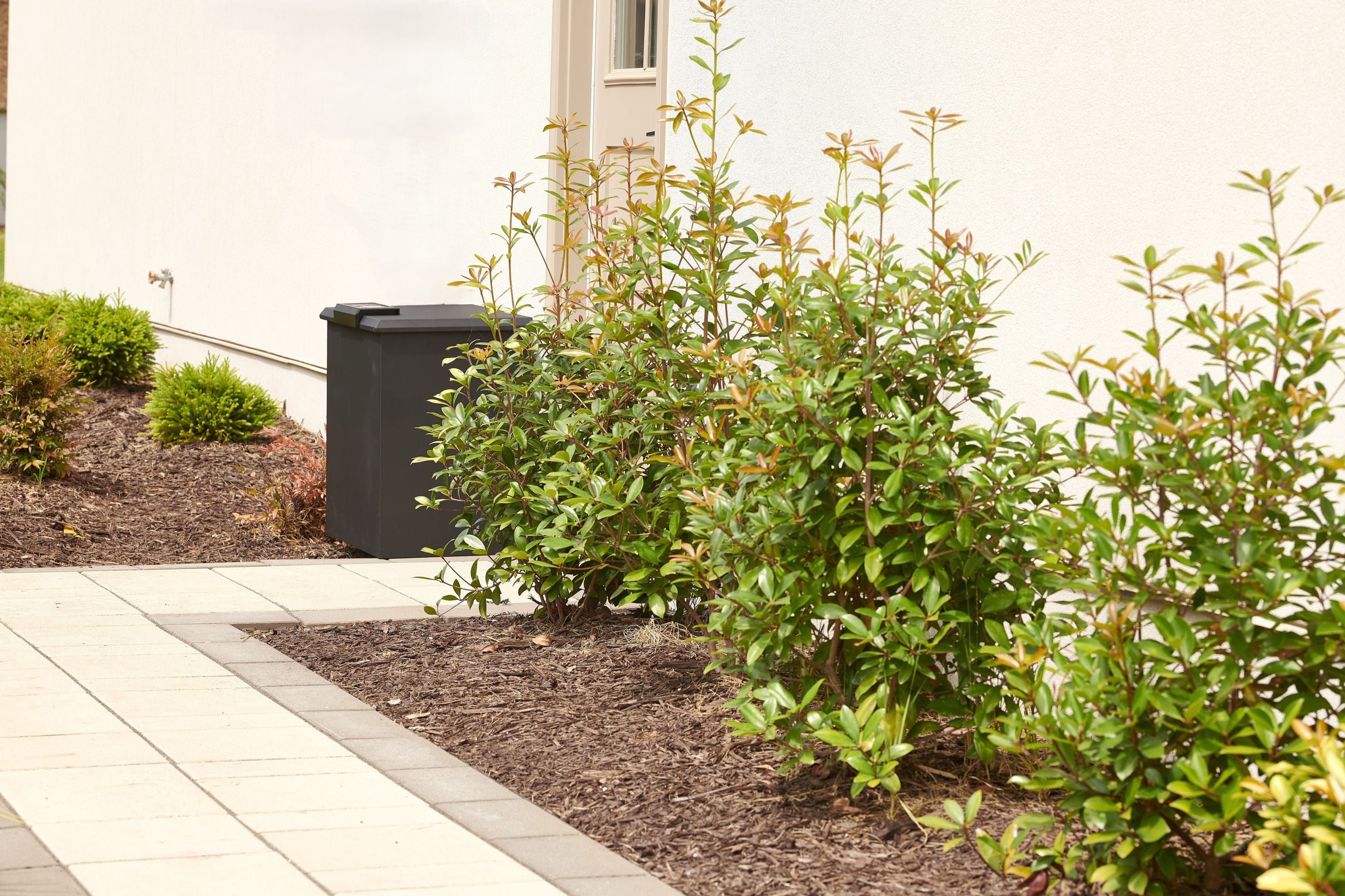Loxx Boxx discretely placed by side of garage.